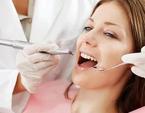 Woman getting a dental exam